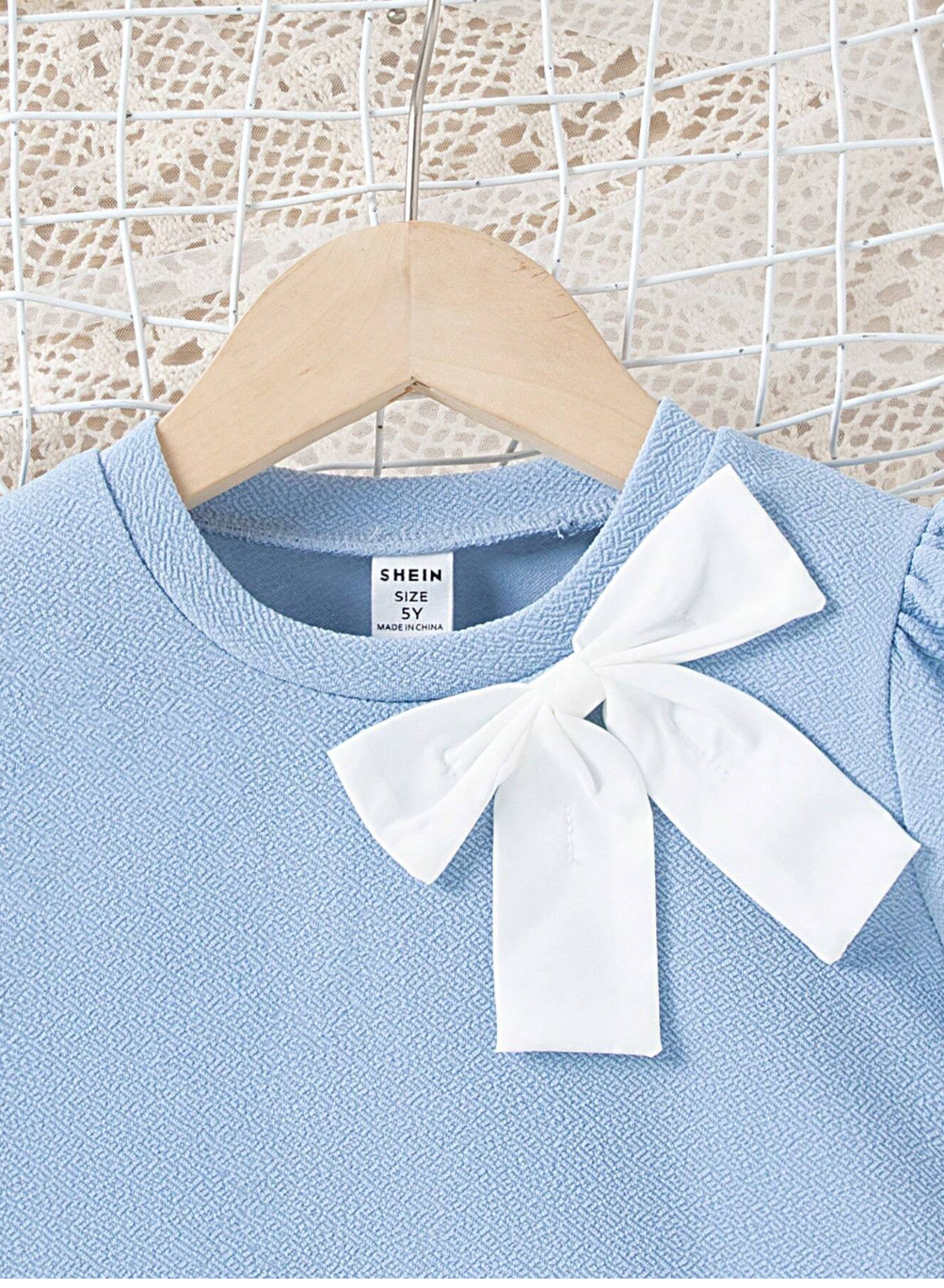 Chic Charm: Young Girls' Pleated Hem Dress with Bow Tie for Spring/Summer Elegance!