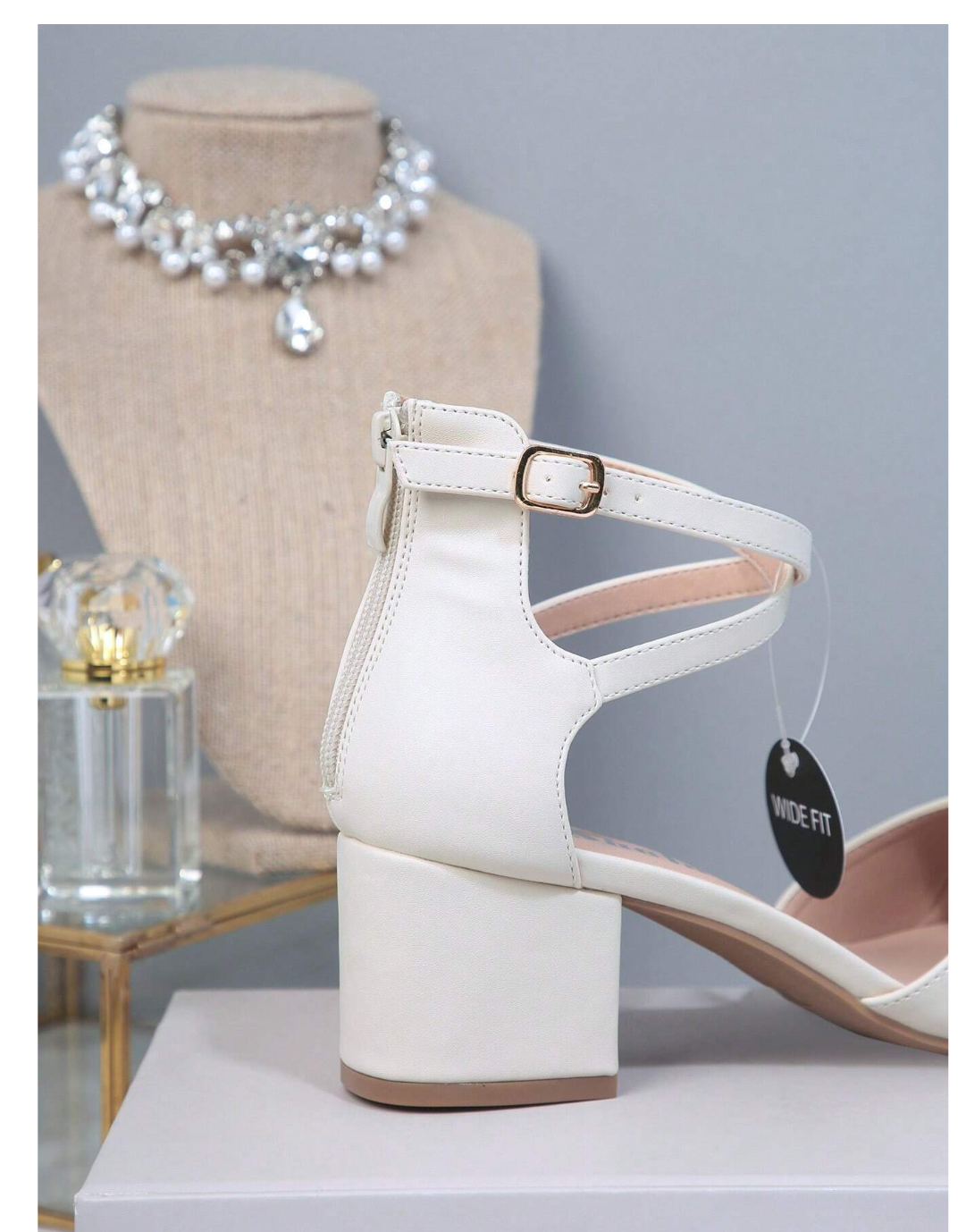 Effortlessly Chic: Minimalist Point Toe Chunky Heeled Ankle Strap Pumps.