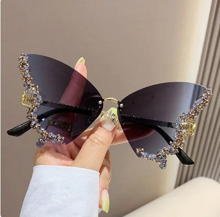 Bedazzle in Style: Luxury Diamond Butterfly Sunglasses - Rimless Rhinestone Shades, a Trendy Punk Eyewear Choice for Women and Men!