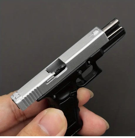 "Mini G17 Gun Model Keychain: A Tactical Marvel for Military Enthusiasts!"